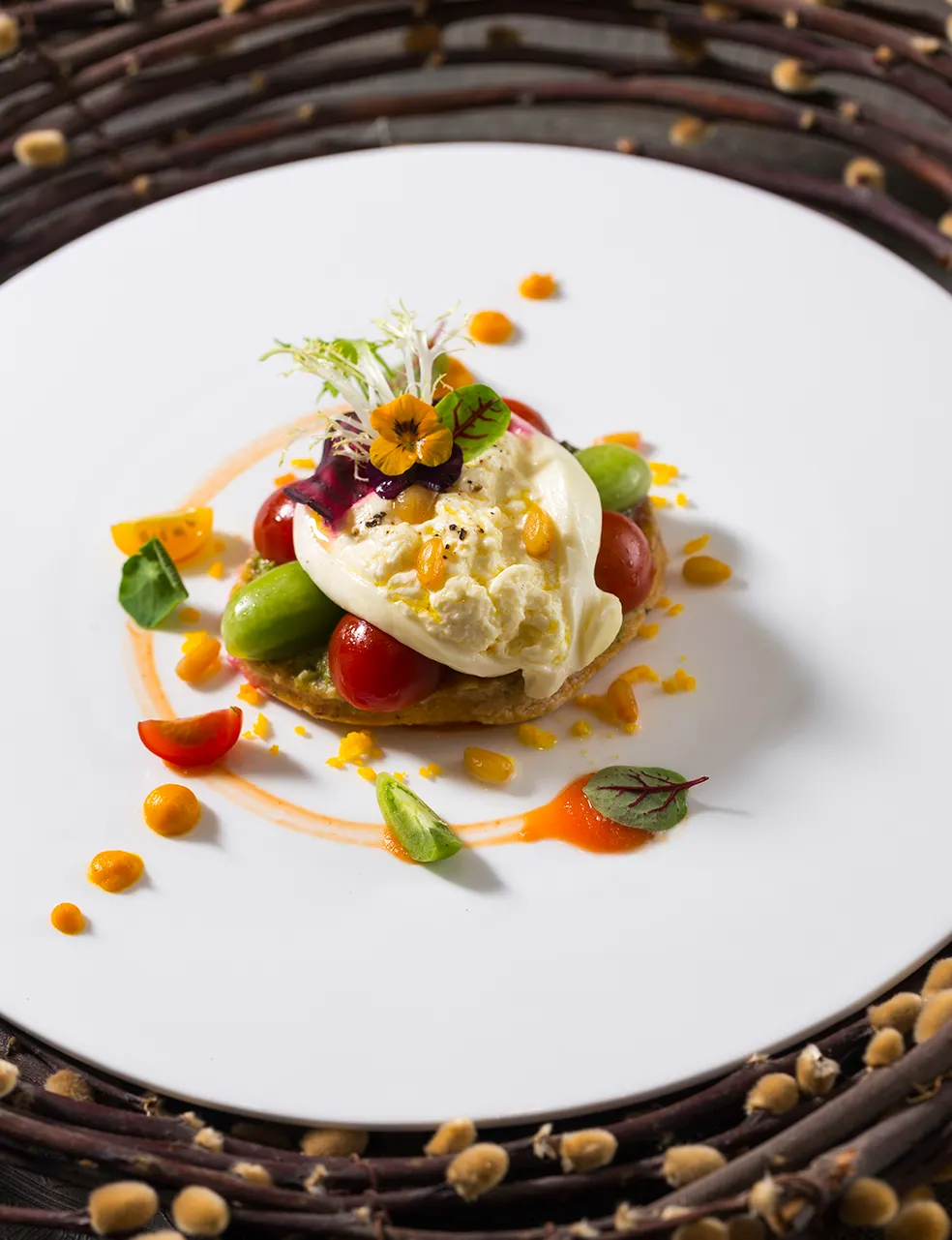 Luxury gala dinner setup at Mulia Bali Grand Ballroom with elegant floral centrepieces