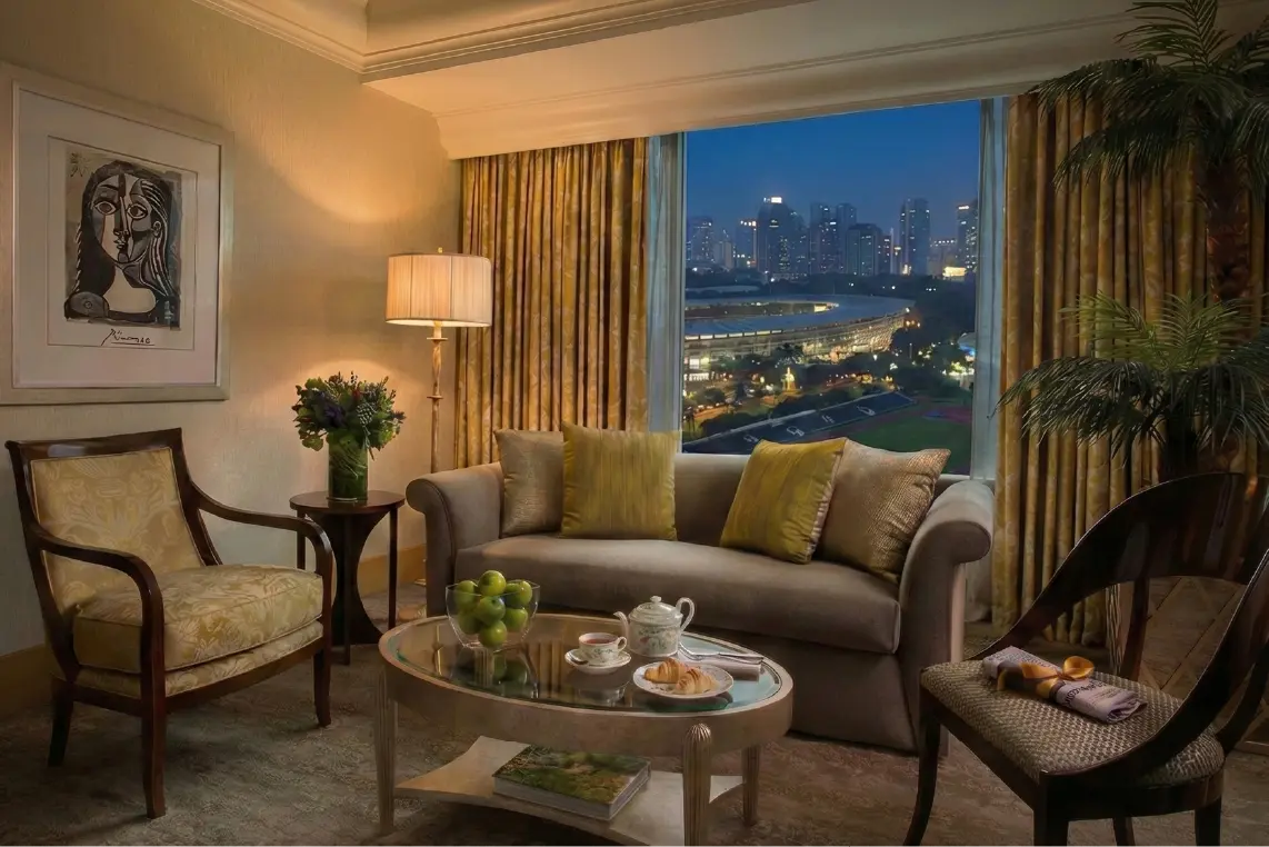 Romantic Valentine’s Day hotel room setup with dinner and luxury gift arrangement