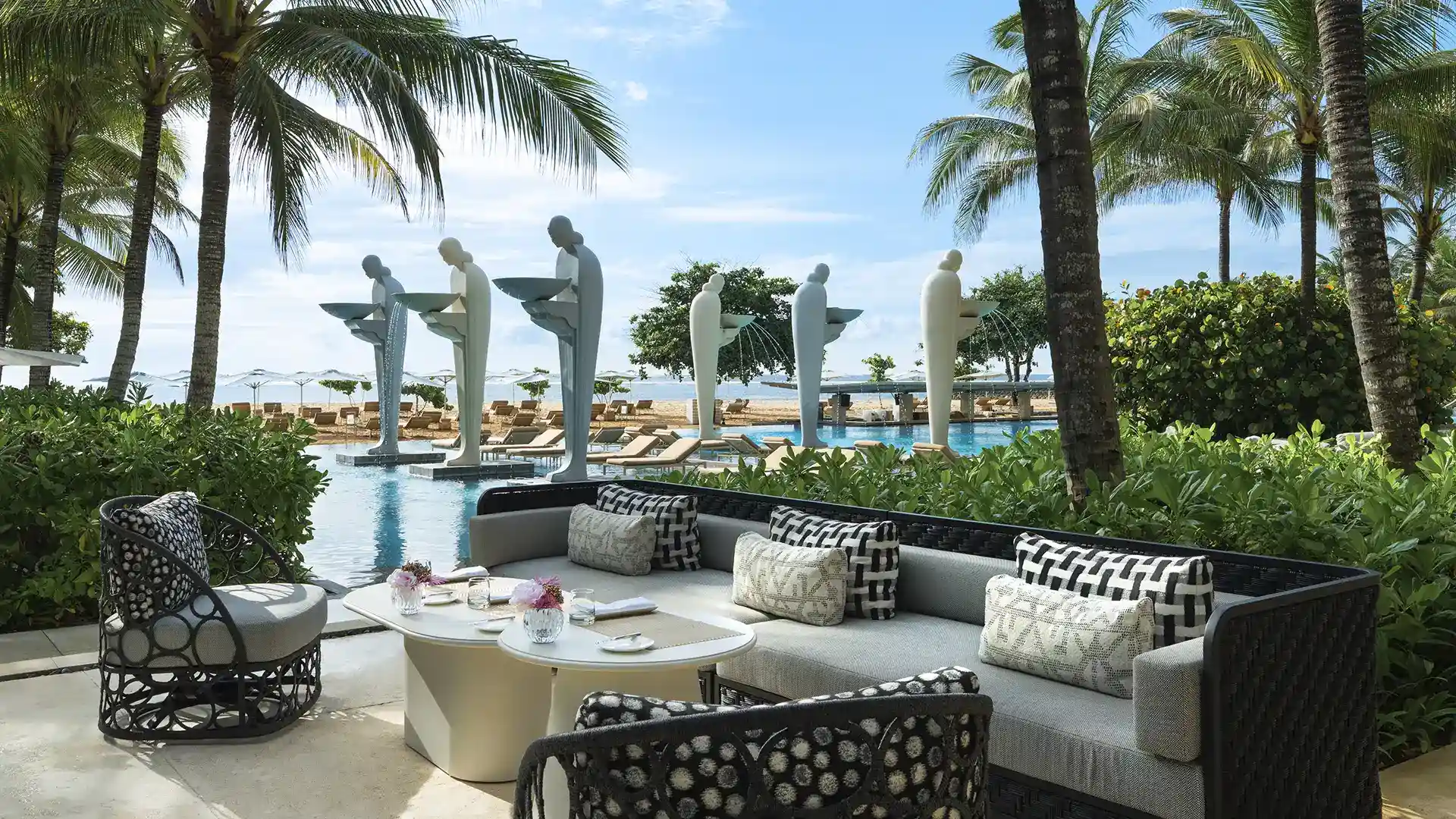 Soleil beachfront restaurant at Mulia Bali with ocean views and open dining space