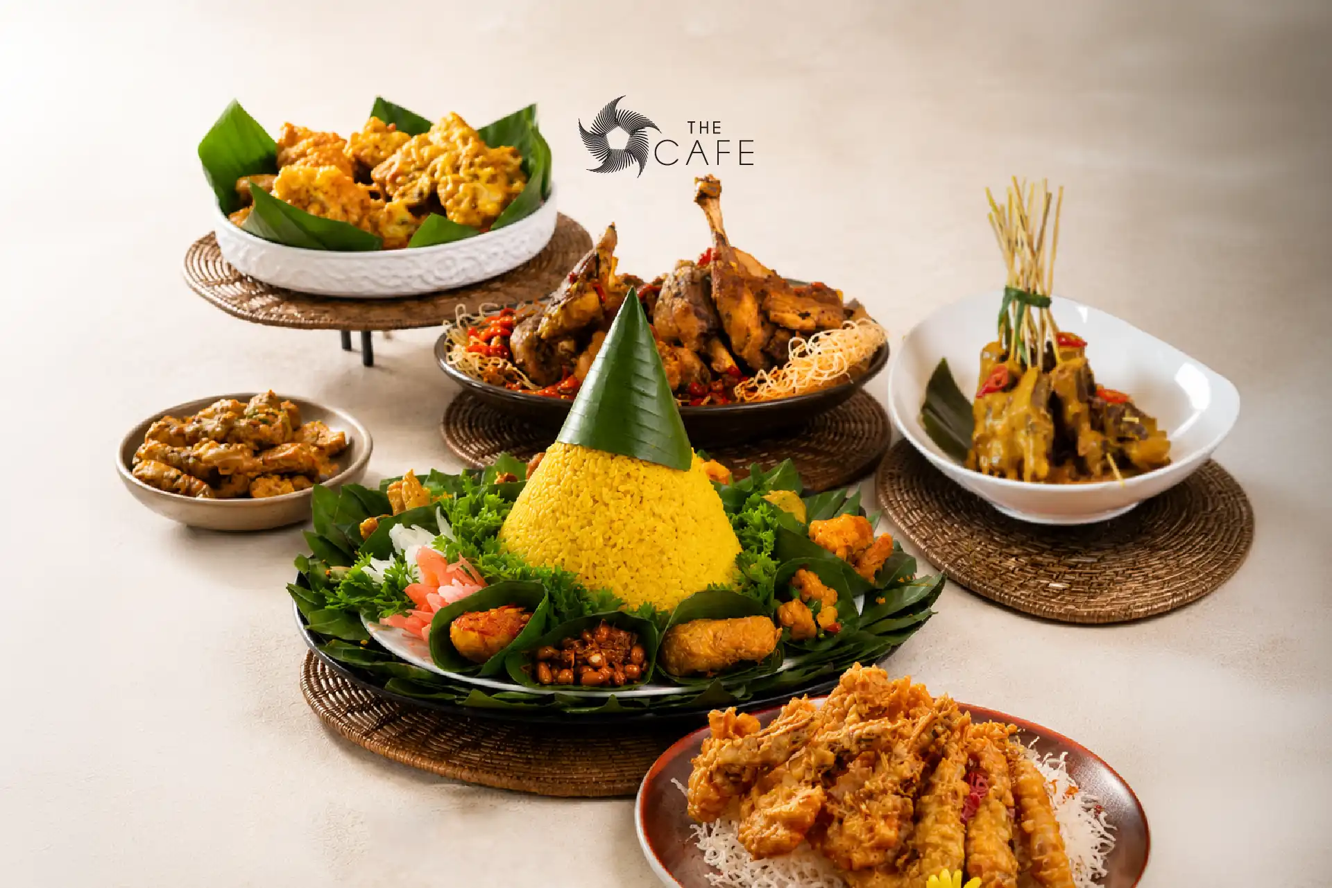 Indonesian Independence Day buffet at The Cafe featuring nasi kuning, rendang, sate Padang, kambing guling, and a selection of authentic Indonesian regional specialties.