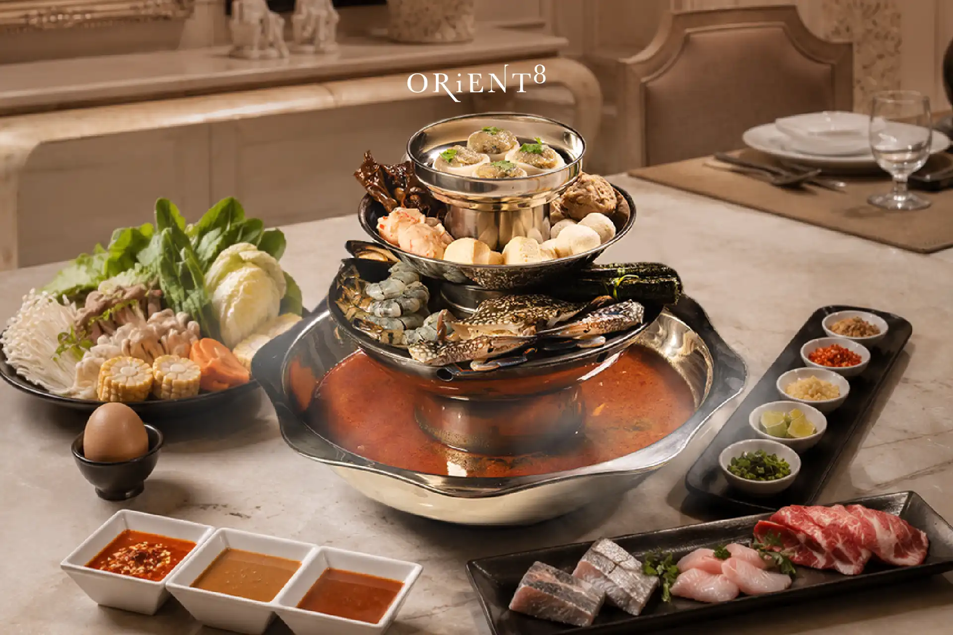 Premium steamboat with fresh seafood, quality meats, vegetables, and rich broth served at Orient8, Hotel Mulia Senayan Jakarta.