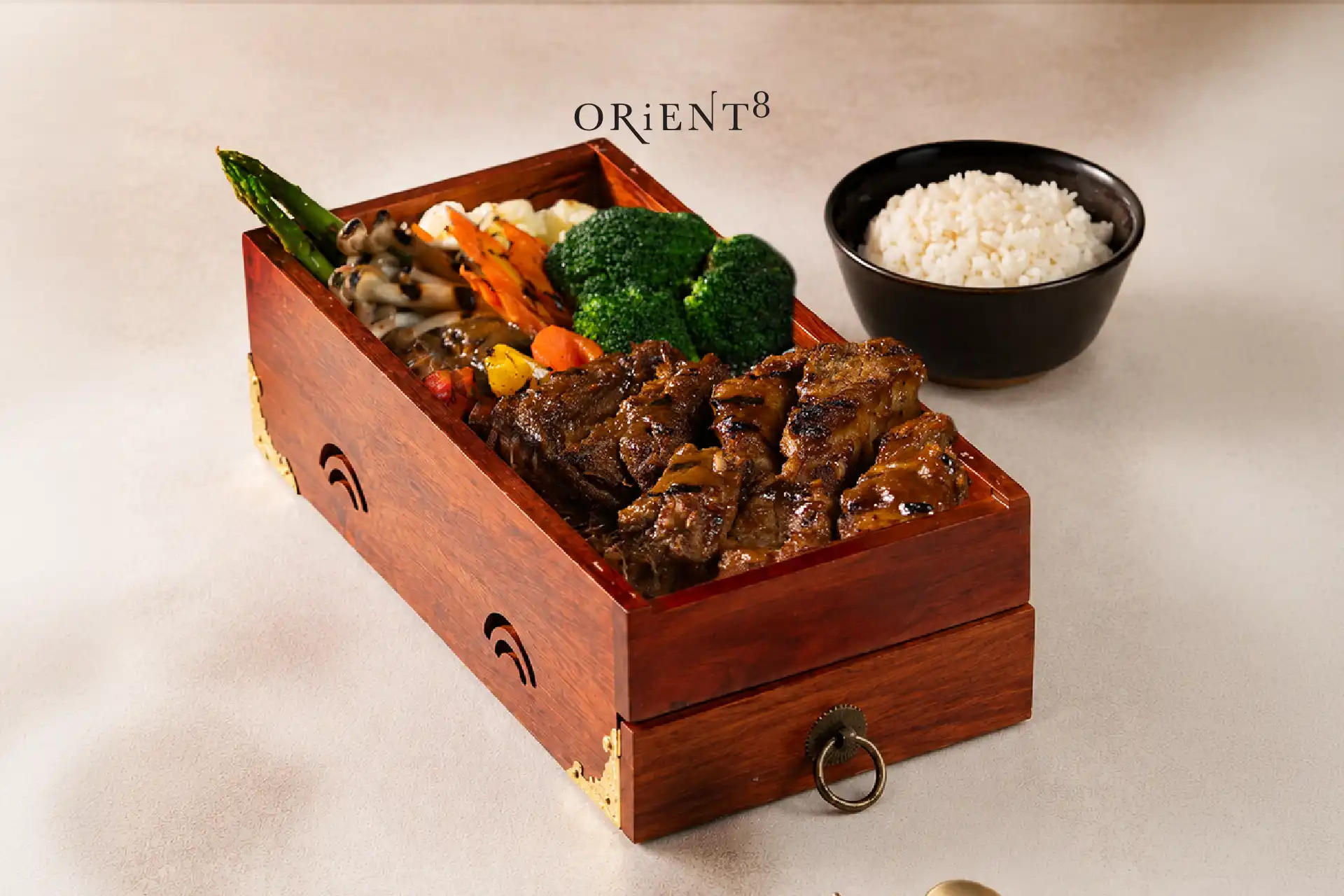 Authentic Korean barbecue platter with grilled meats, vegetables, rice, and traditional Korean dishes at Orient8, Hotel Mulia Senayan Jakarta.