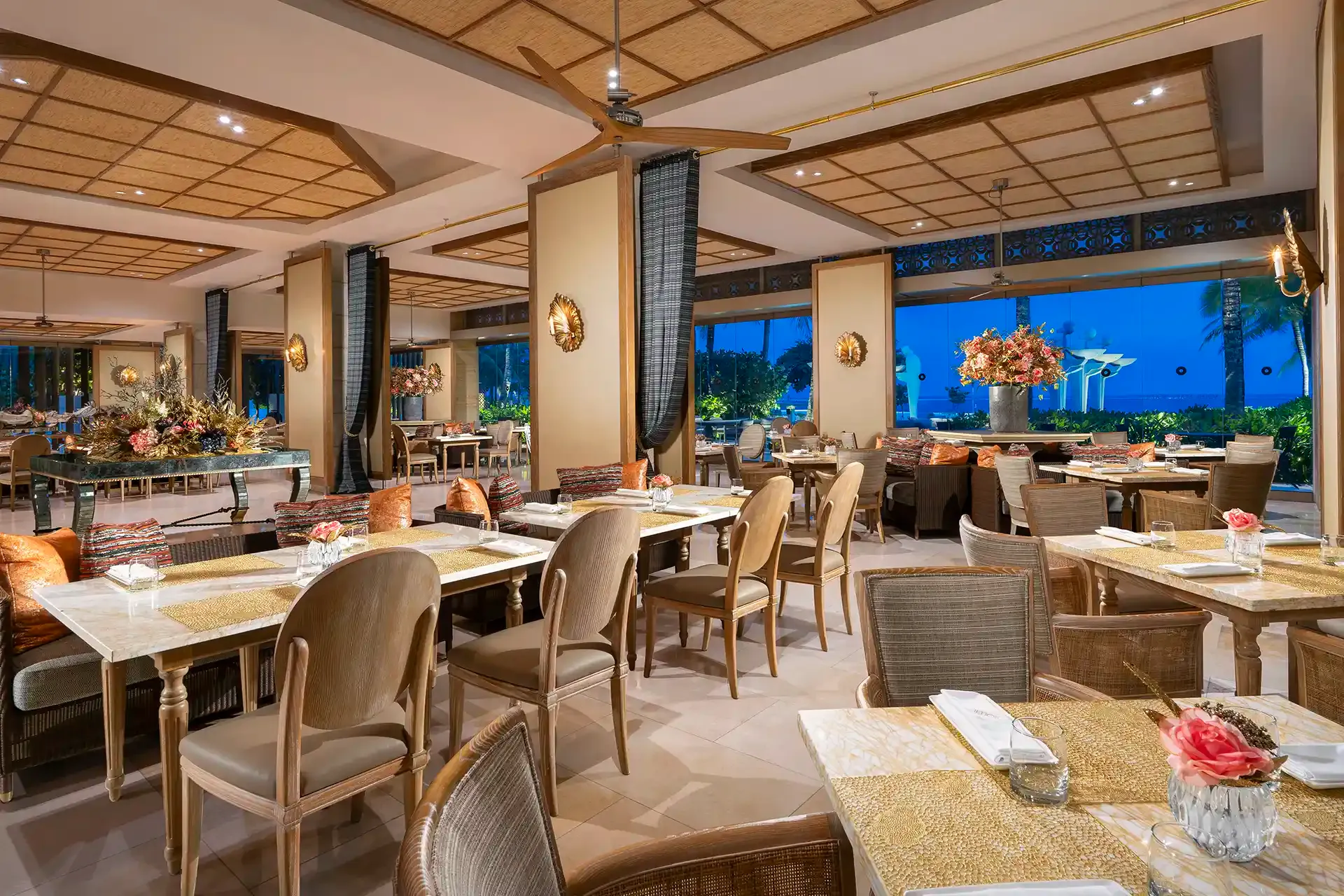 Soleil beachfront restaurant at Mulia Bali with ocean views and open dining space