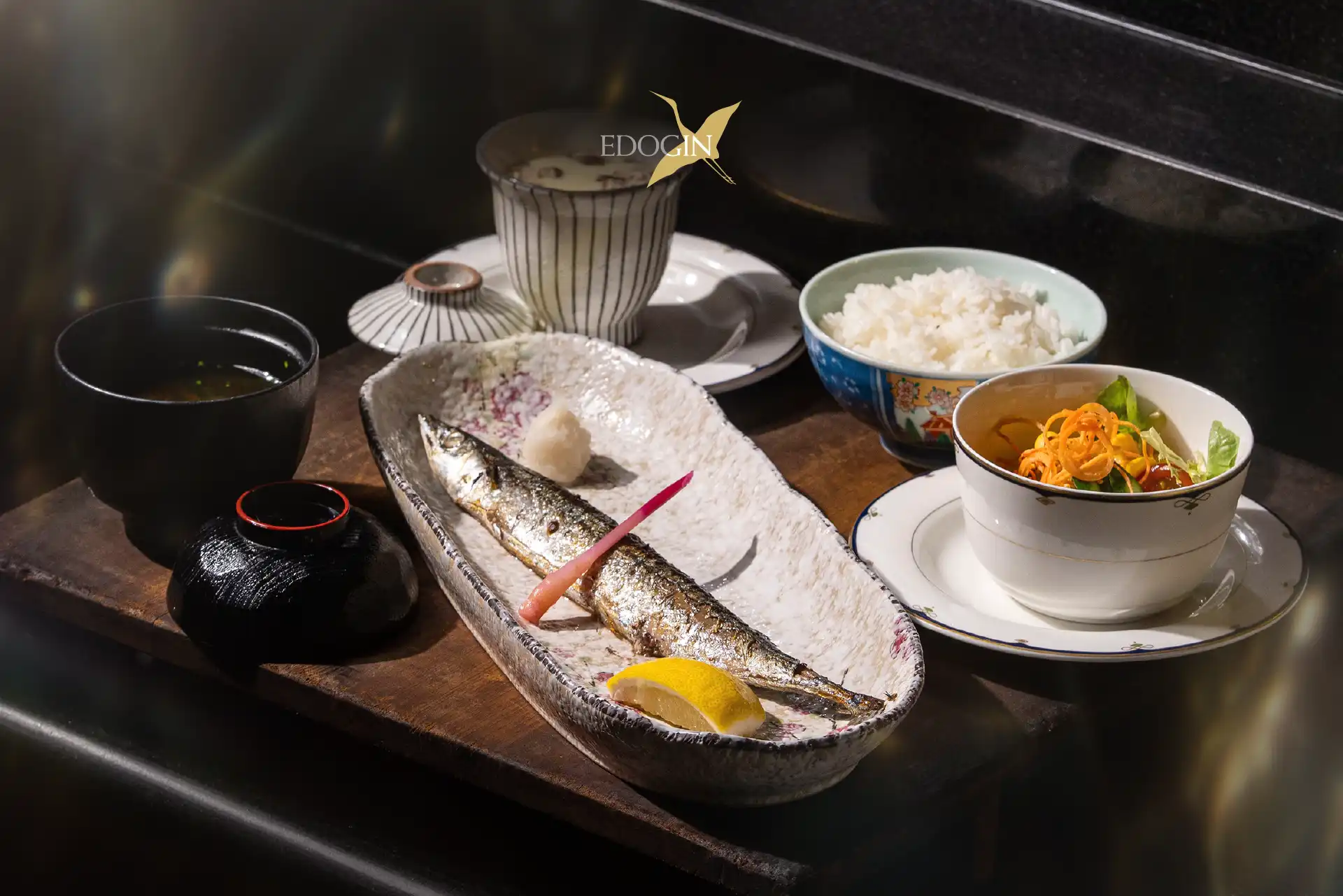 Sanma Pacific saury served in traditional Japanese Teriyaki and Shioyaki styles with rice and side dishes at Edogin, Hotel Mulia Senayan, Jakarta.