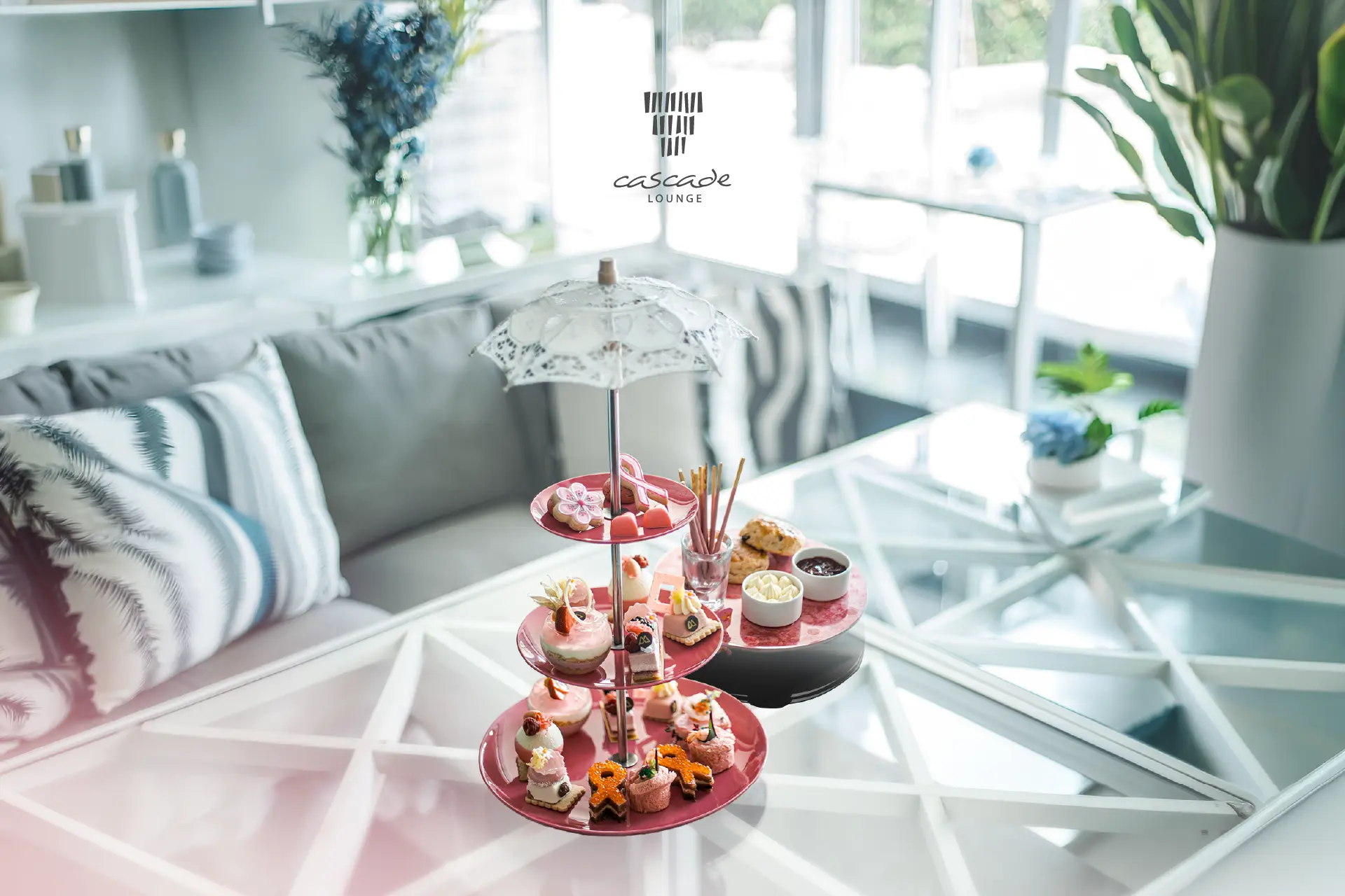 Three-tiered afternoon tea stand with sweet and savoury pastries, part of A Rosy Afternoon at Cascade Lounge, Hotel Mulia Senayan-Jakarta.