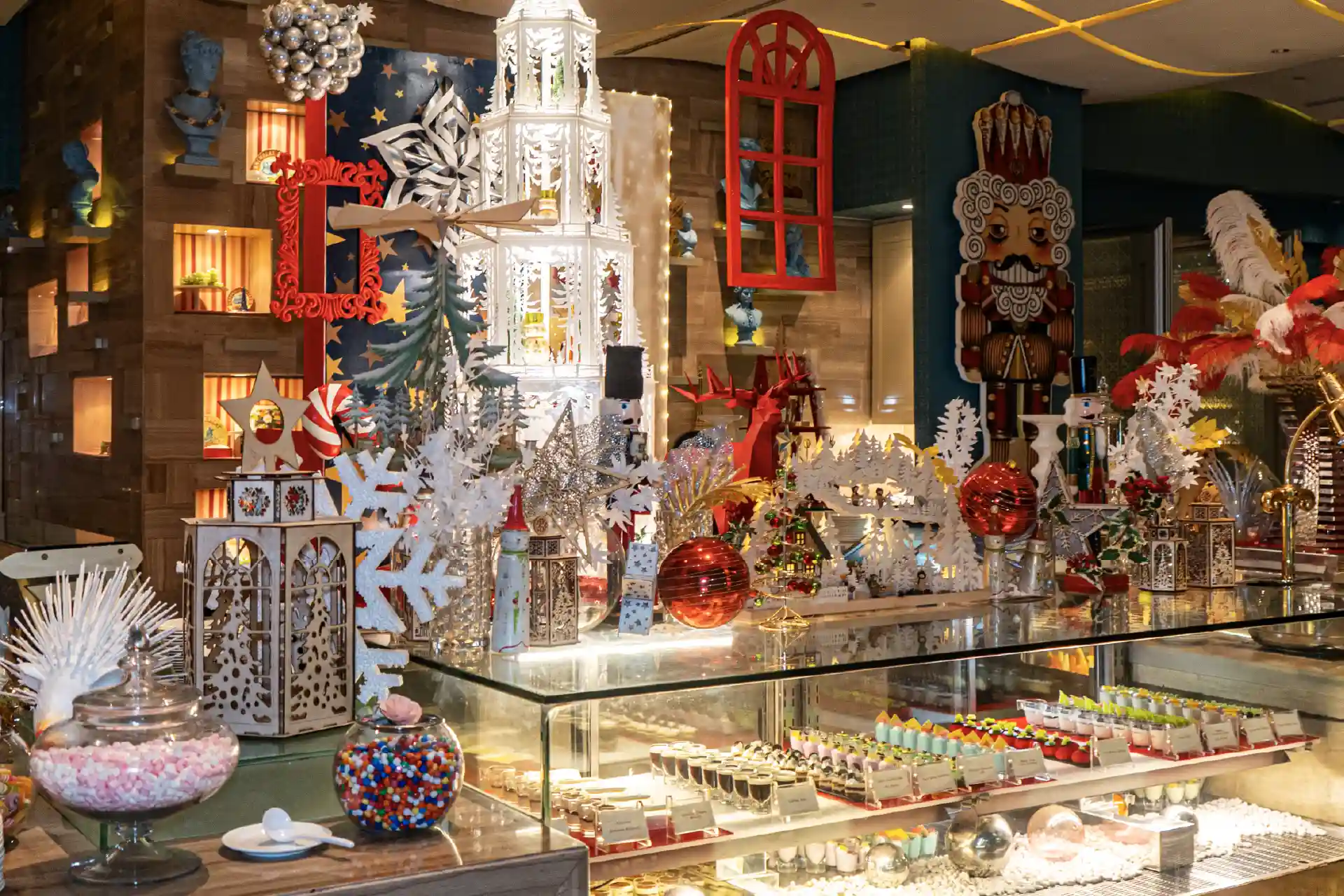 Festive Dining at Hotel Mulia Senayan Jakarta, featuring an elaborate Christmas display and festive decorations at The Cafe, with dining offers across six signature restaurants and lounges.
