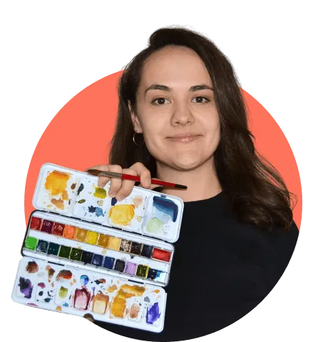 Woman smiling with water paint in hand