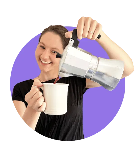 Woman with French-press smiling