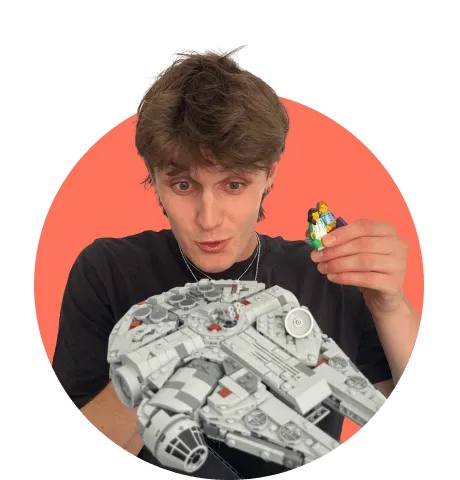 Man with legos smiling