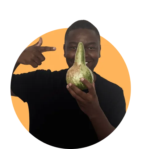 Man smiling with fruit in hand