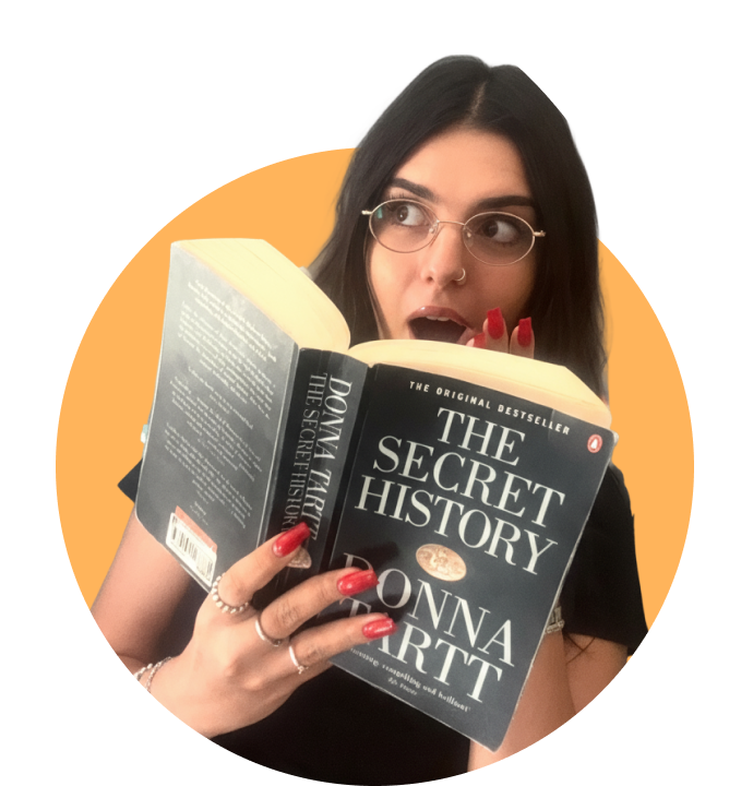 Woman holding a book startled
