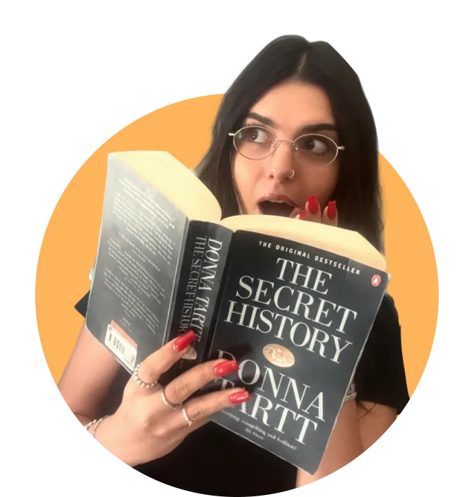 Woman holding a book startled