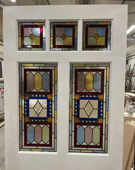 Hardwood front door with stained glass