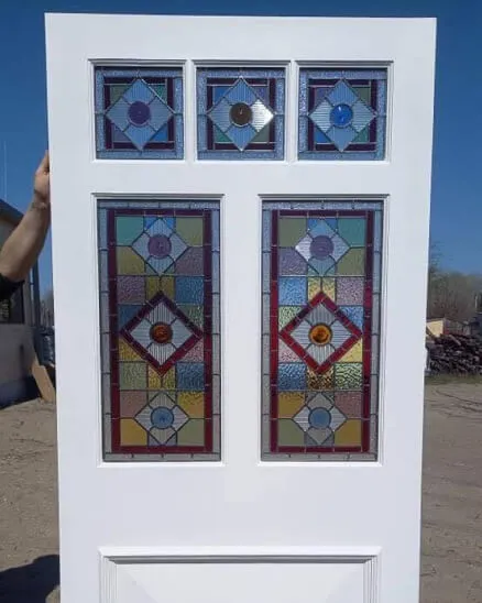 edwardian period front door with geometric stained glass design