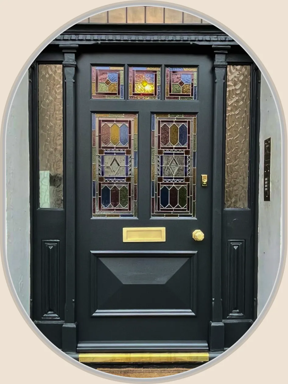 Handcrafted traditional front door with stained glass, fitted to a London home