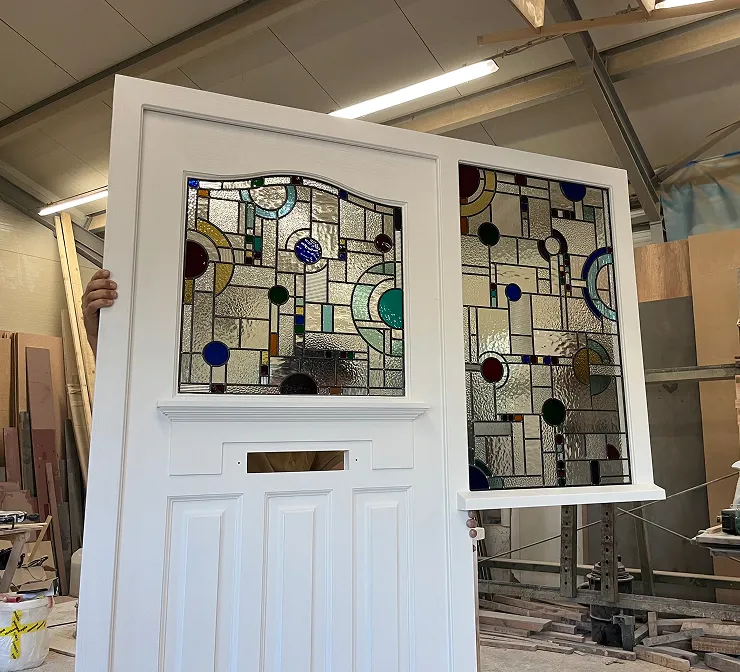 art deco stained glass front door with side window