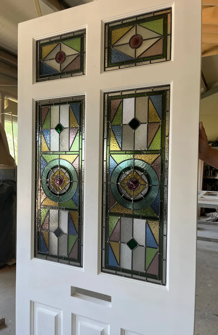 Edwardian style front door with geometric stained glass design