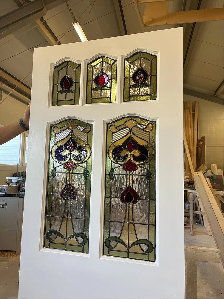 victorian front door with stained glass