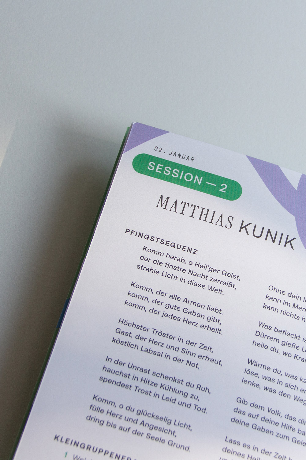 Detailaufnahme einer Buchseite mit einer Sessionüberschrift, dem Namen Matthias Kunik und deutschsprachigem Text zur Pfingstsequenz.