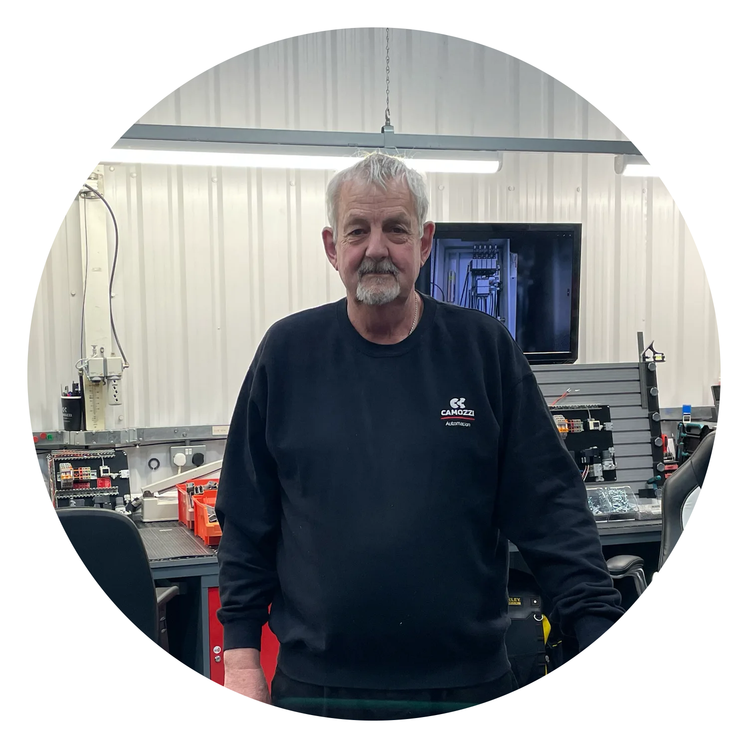 Mike Rollason, Systems and Assembly Supervisor at Camozzi Automation UK, standing in the UK Automation Centre workshop.