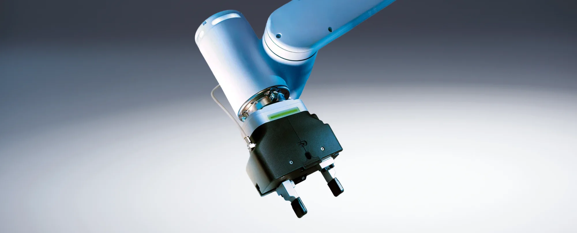 Camozzi Series CSPT smart parallel collaborative grippers on a robotic arm for flexible, intelligent automation.