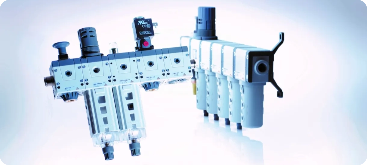 A complete Camozzi modular air preparation assembly, featuring filters, regulators, and lubricators designed to ensure optimal compressed air cleanliness and pressure.