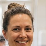 Inhaberin eines Catering-Betriebs, die eine Sprachnachricht über TrackPro hinterlassen hat