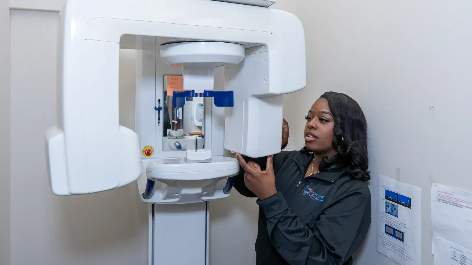 Team member preparing X-Ray machine