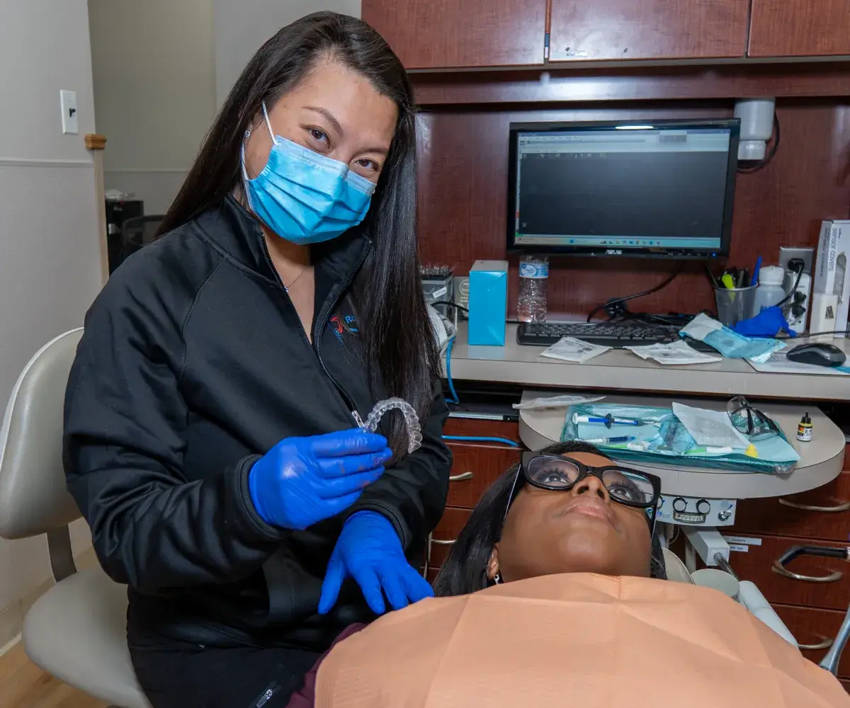 Dr. Phung checking patient