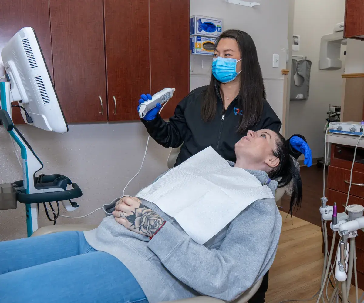 Dr. Phung checking patient