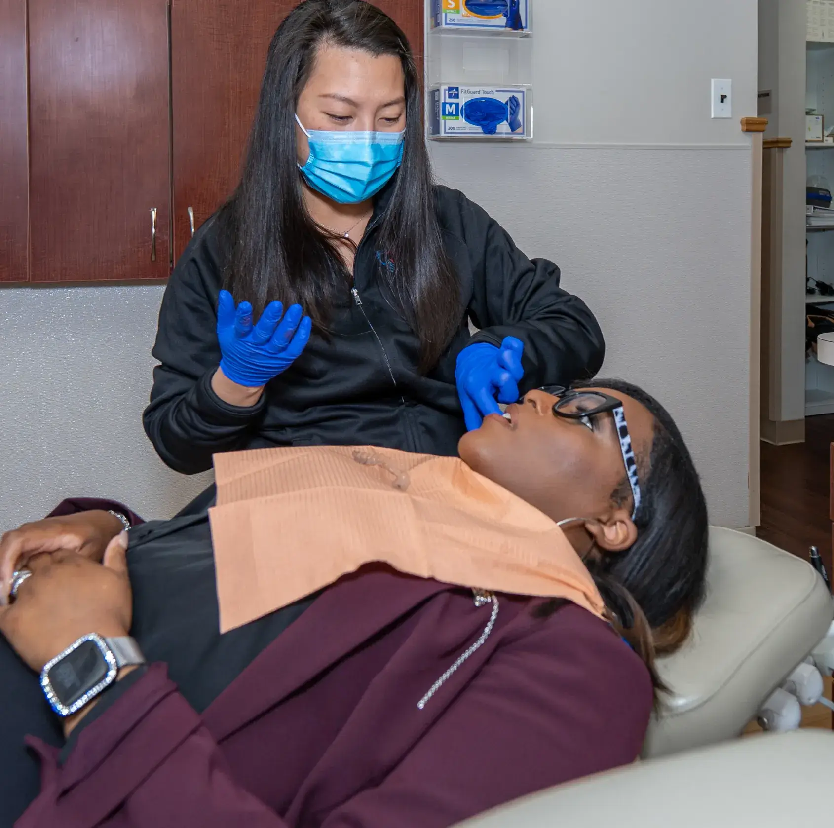 Dr. Phung checking patient
