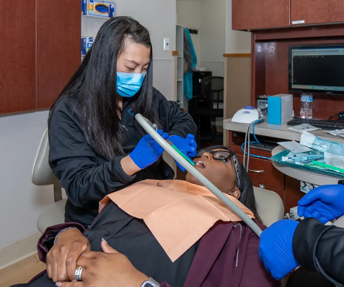 Dr. Phung checking patient