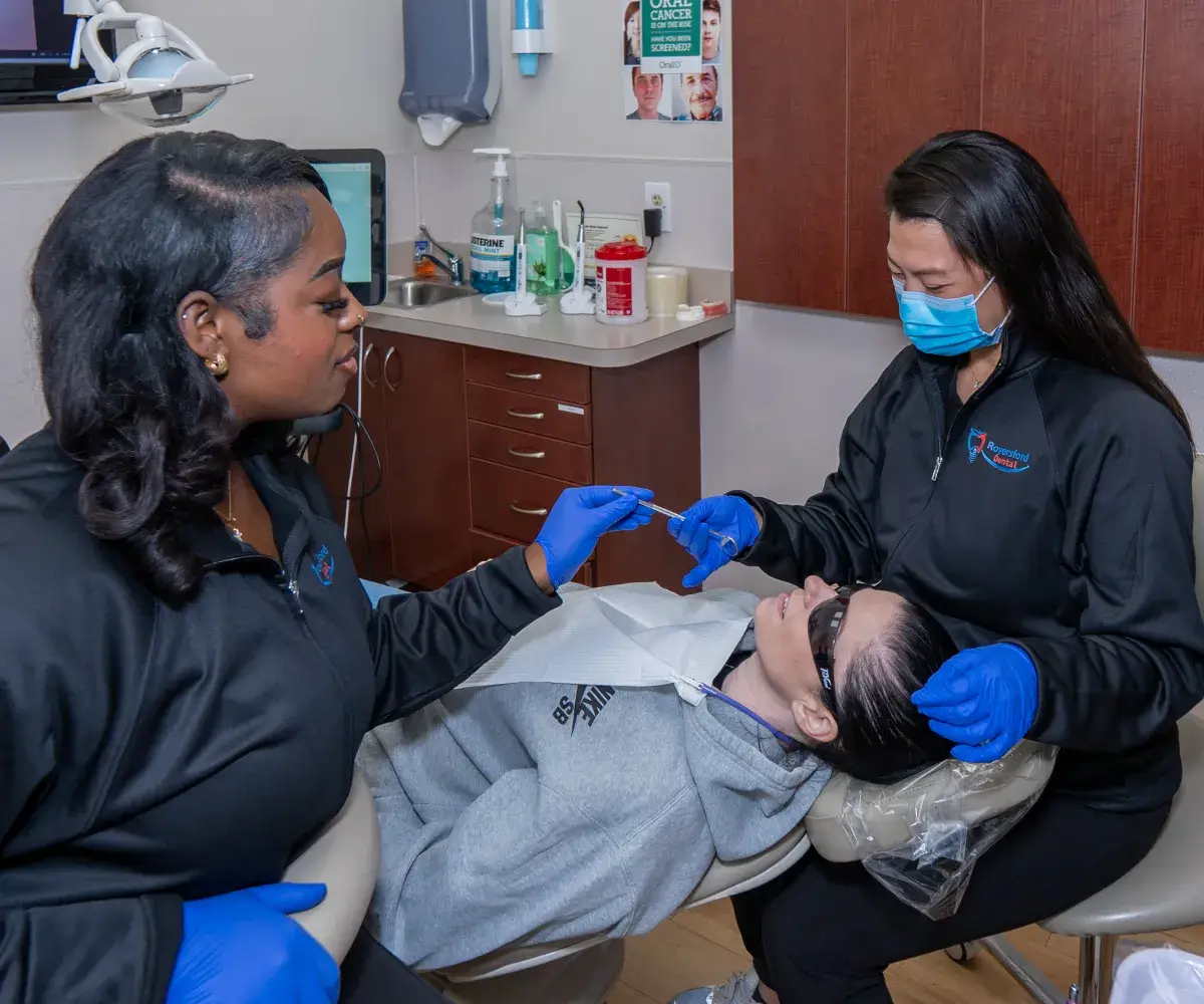 Dr. Phung checking patient