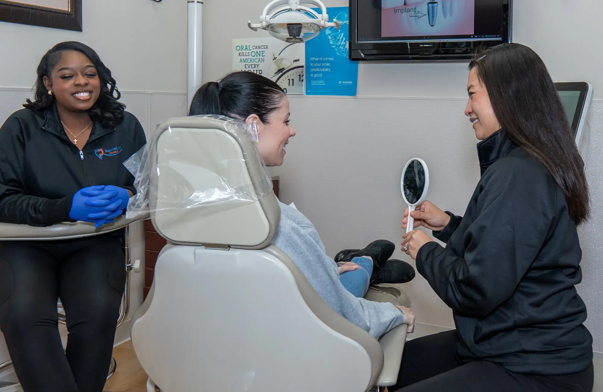 Dr. Phung showing patient the mirror