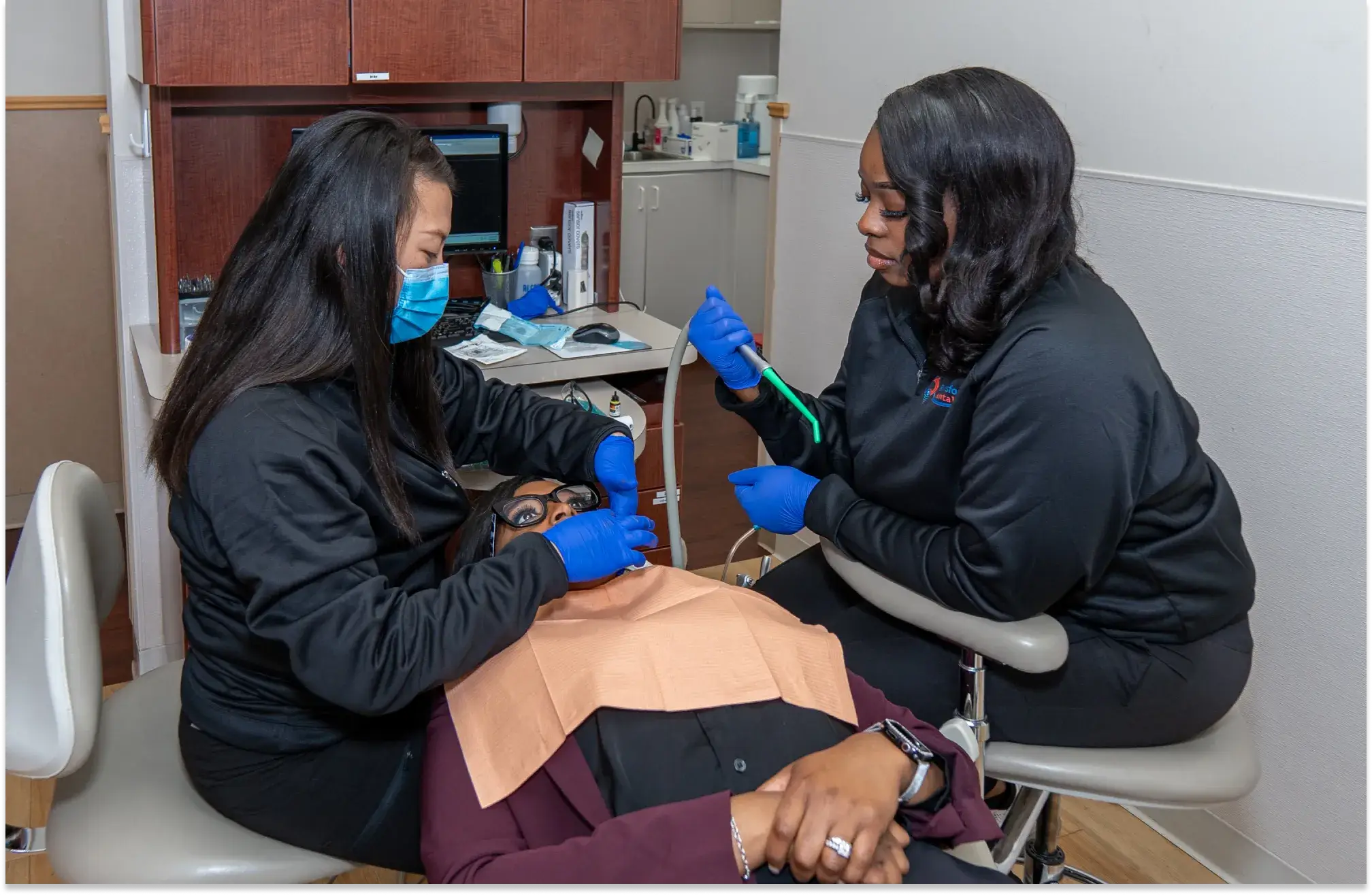 Dr. Phung checking patient