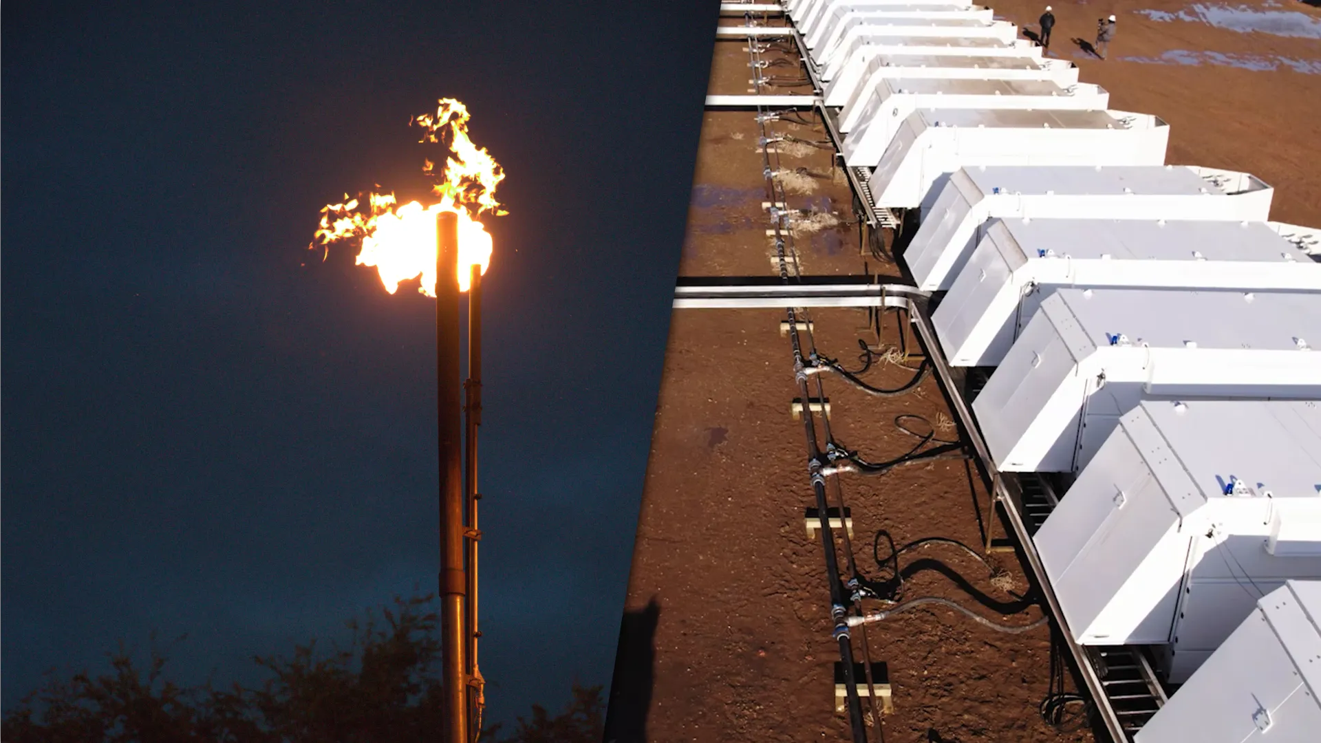 Gas flare burning at night beside rows of white electrical containers on red dirt ground.