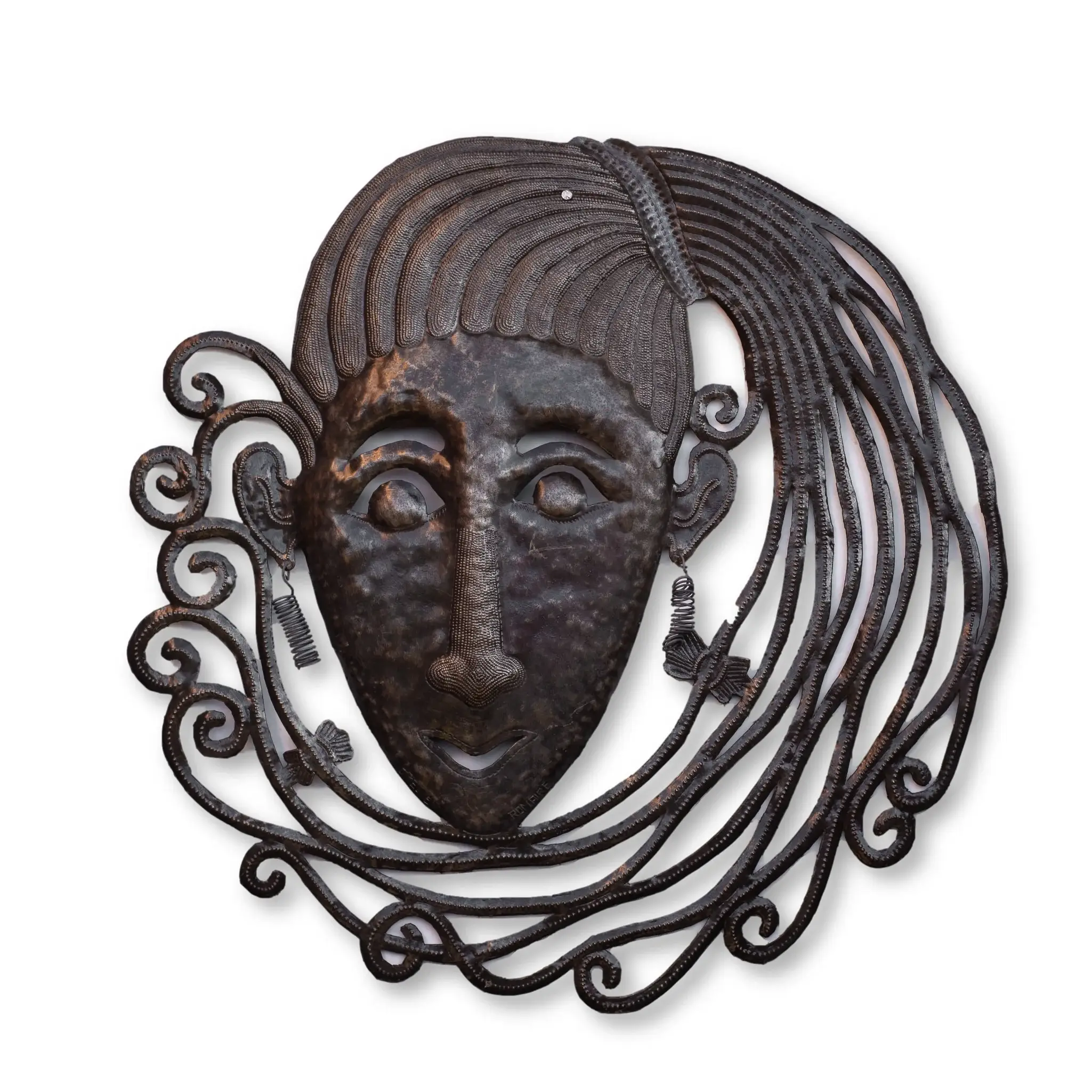 Haitian metal art of a woman's face
