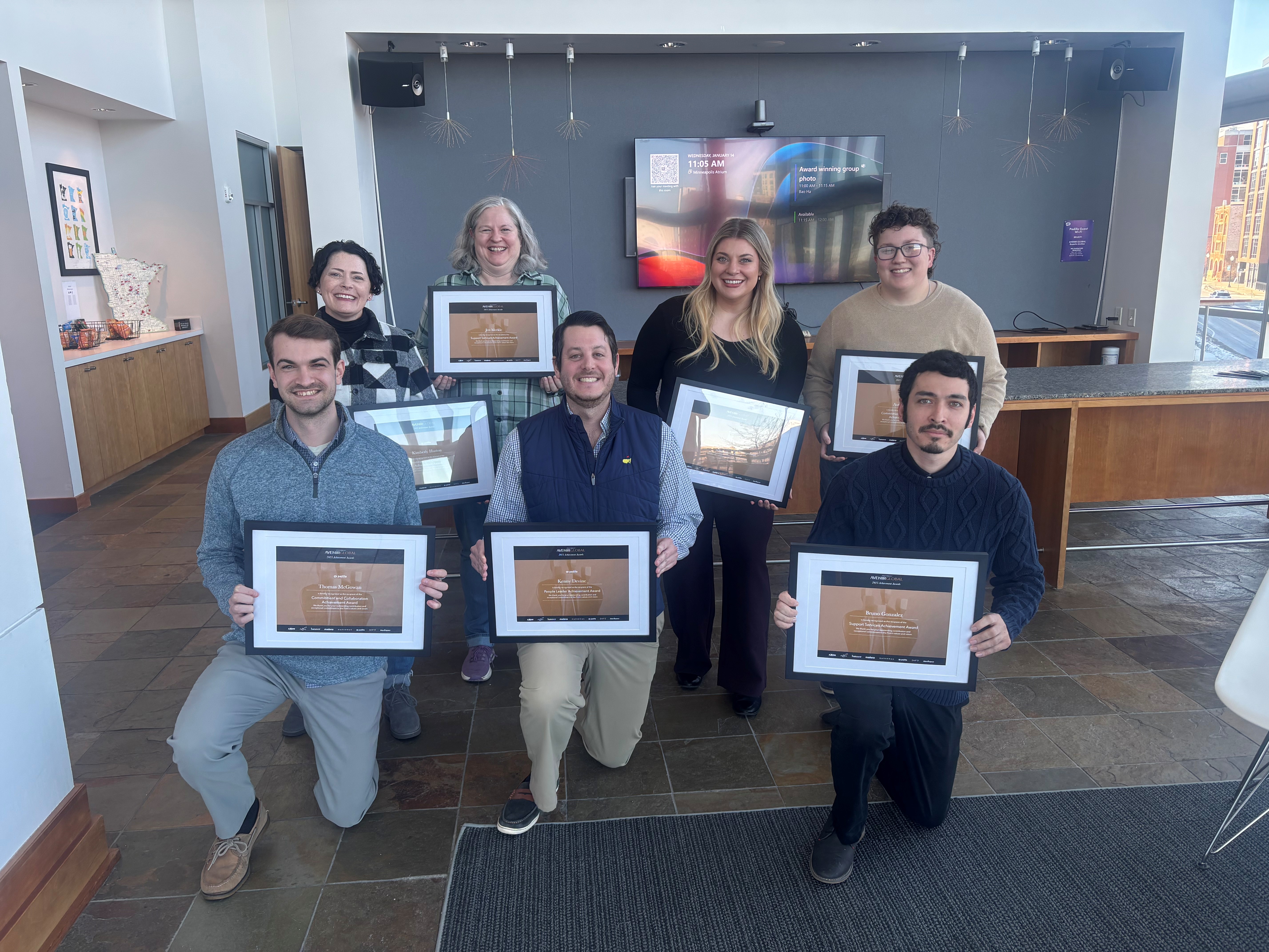 The 2025 Avenir Global award winners in Minneapolis holding their awards certificates. 