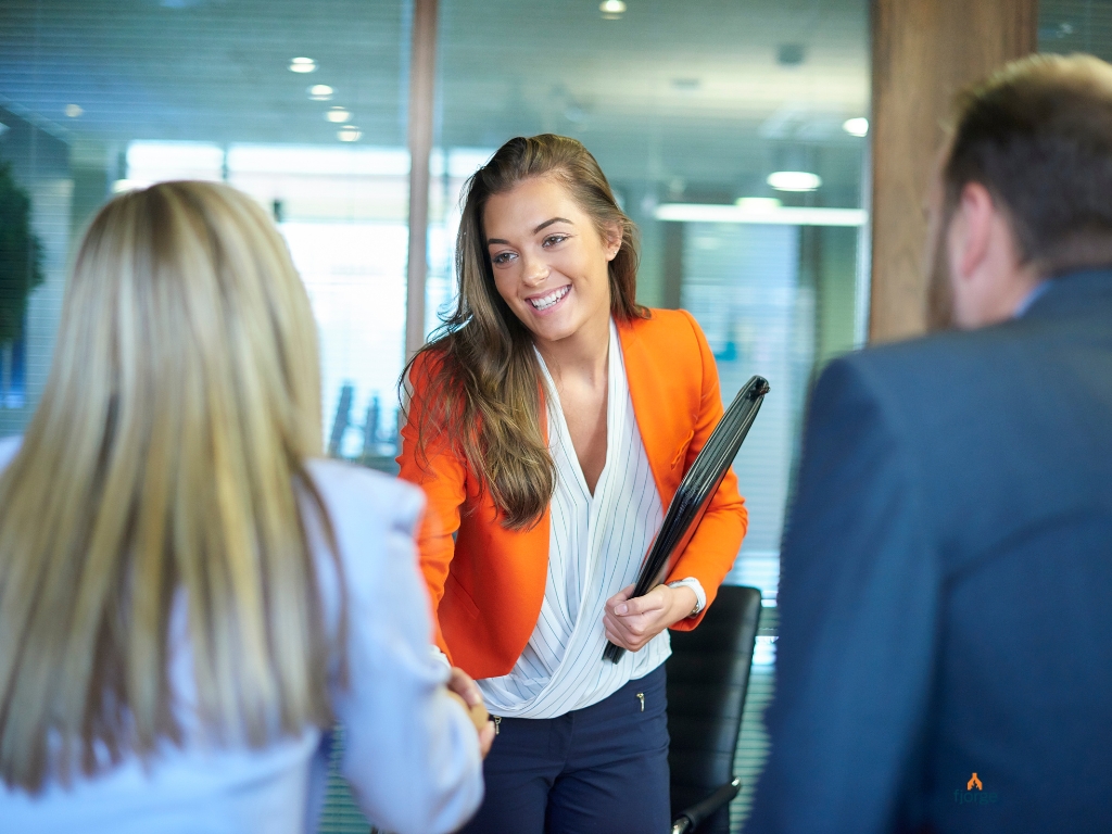 Team reviewing a digital project during QA process