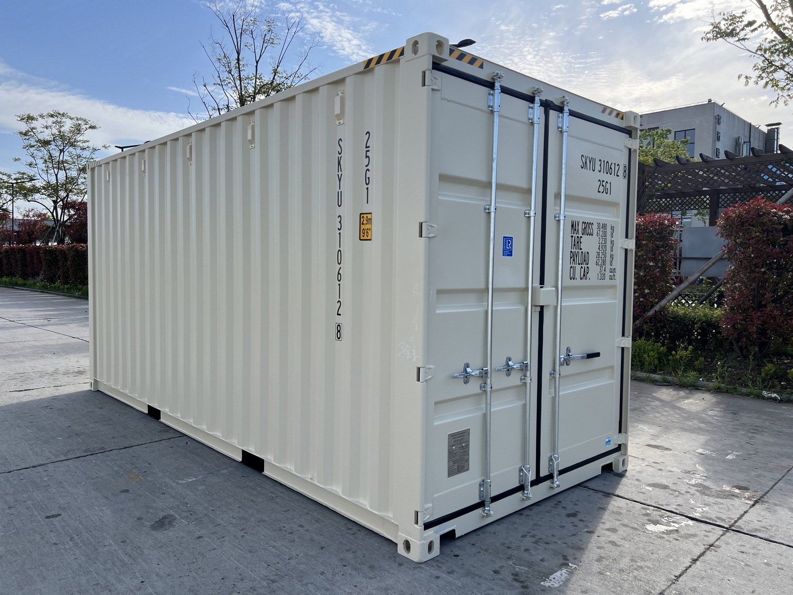 New light yellow shipping containers stacked onto of each other