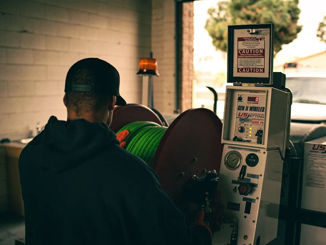 plumber detecting a leak