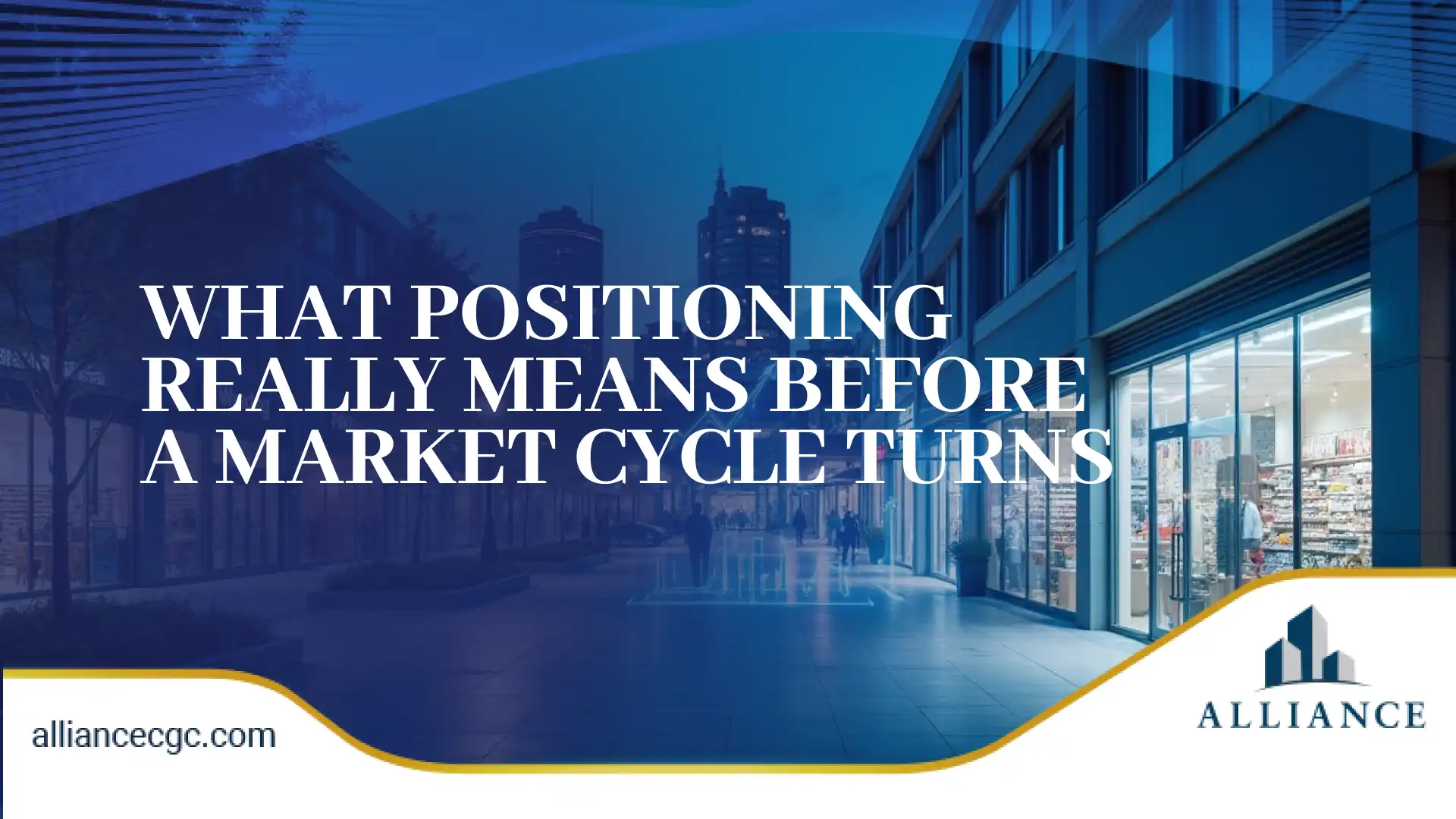Urban street with illuminated storefronts reflecting commercial real estate market cycle  