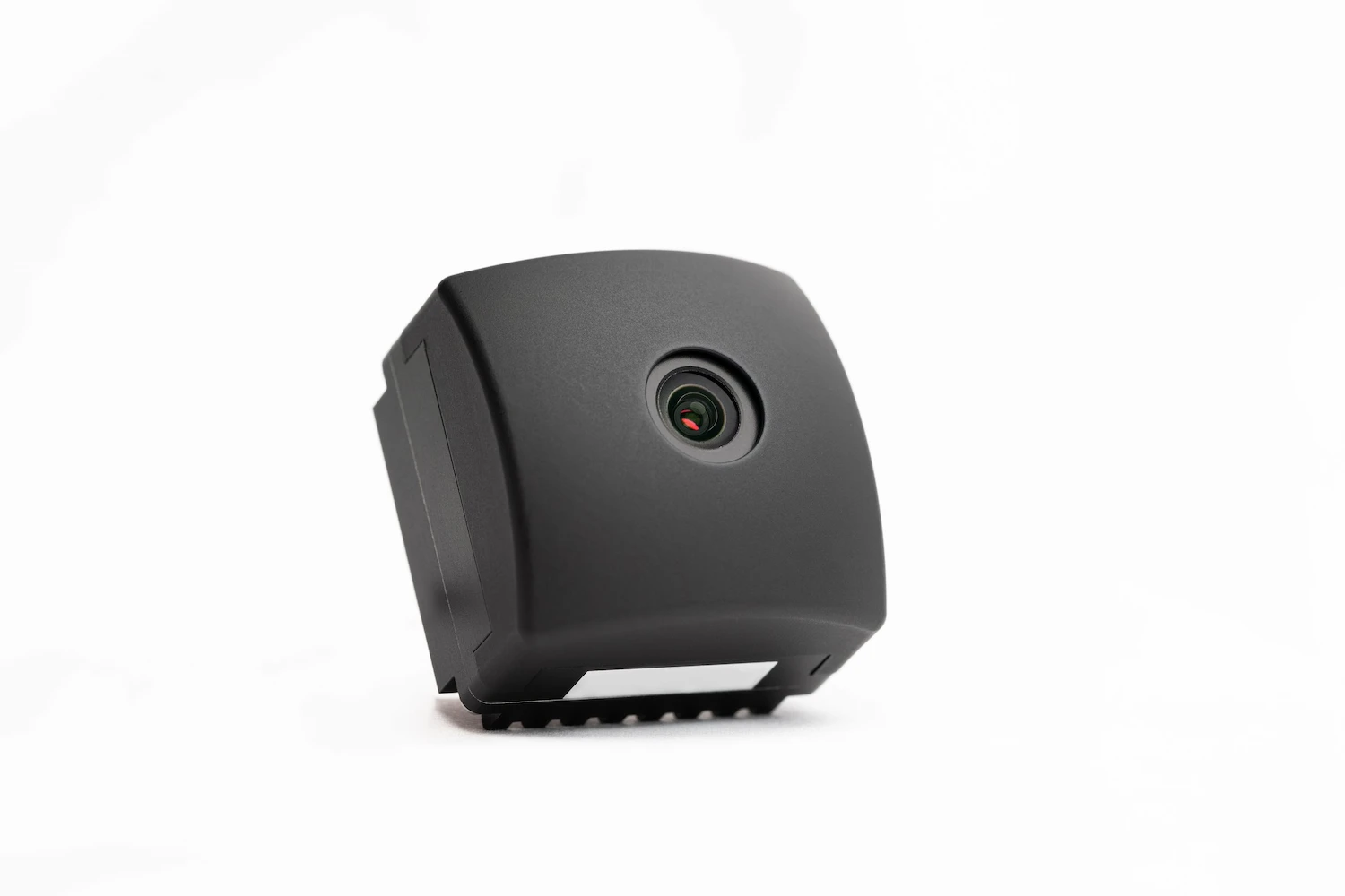 Black compact camera in a black body, seen from a different point of view. 