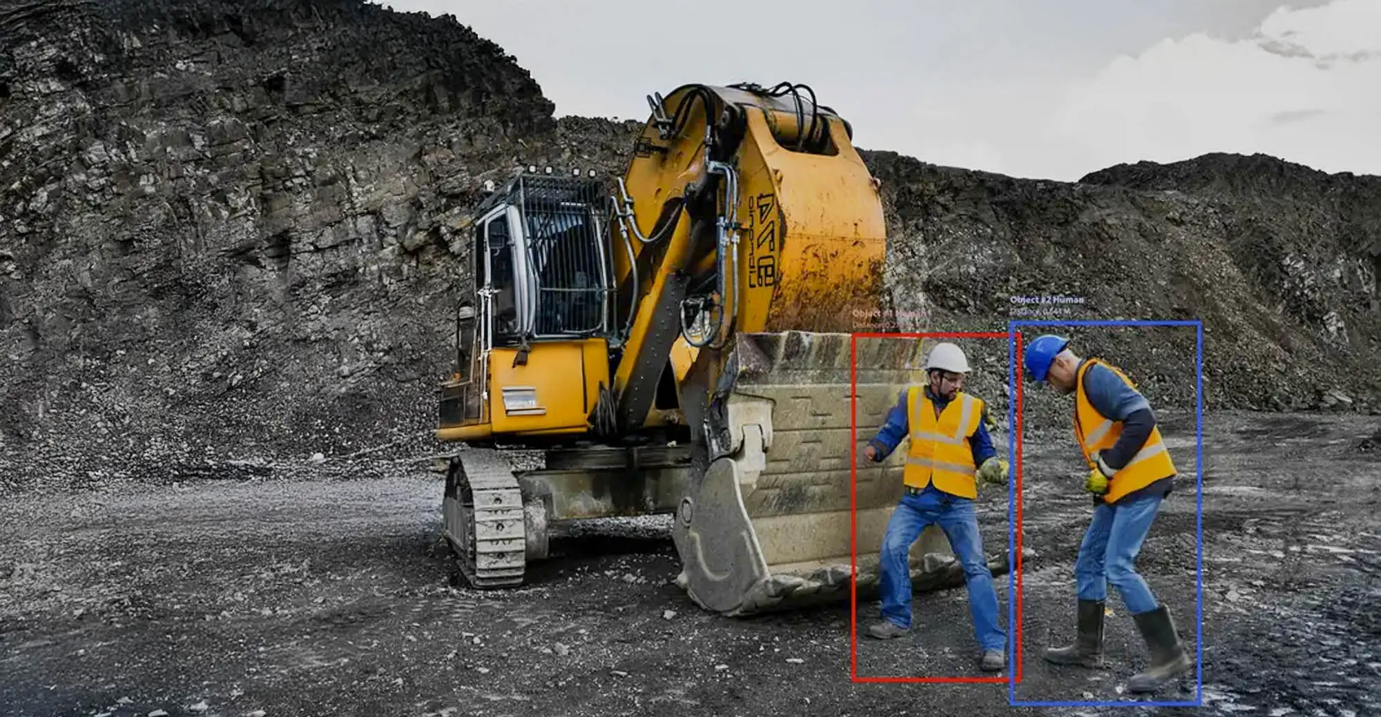 Shows two workers on the construction site who are recognized by a computer vision system.