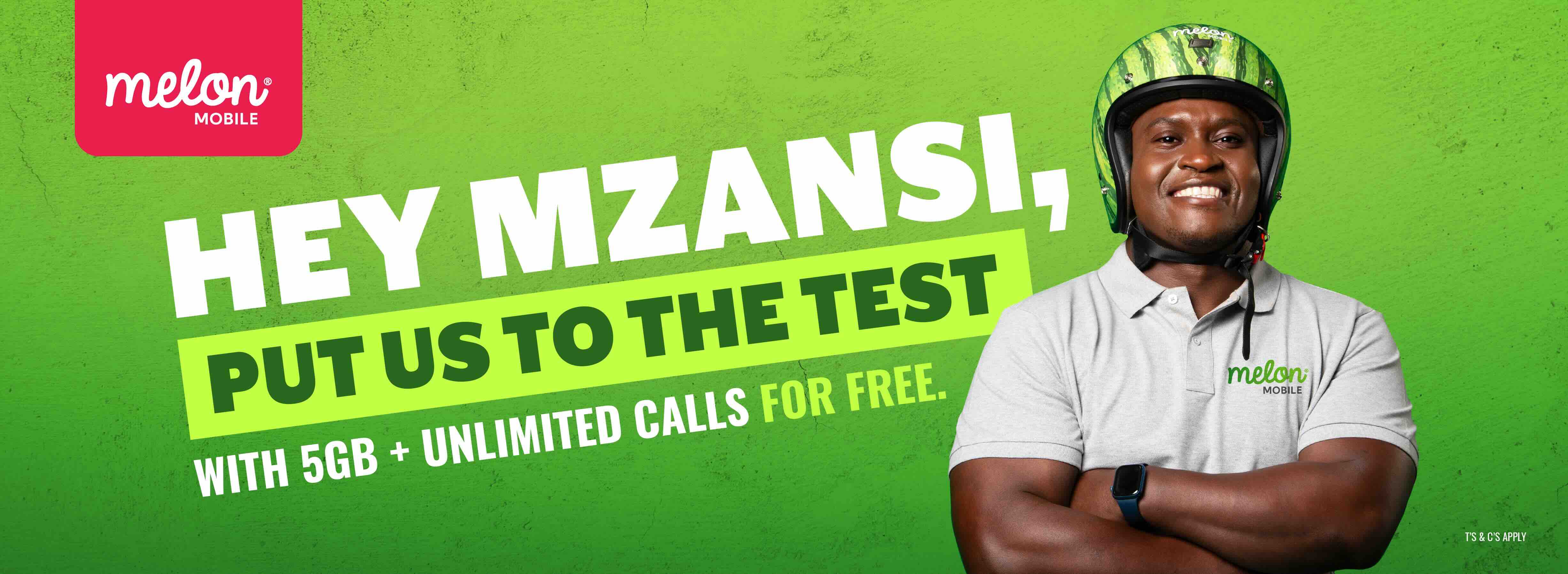 Smiling man wearing a watermelon-patterned helmet and melon mobile shirt, with text promoting a free trial of 5GB and unlimited calls.