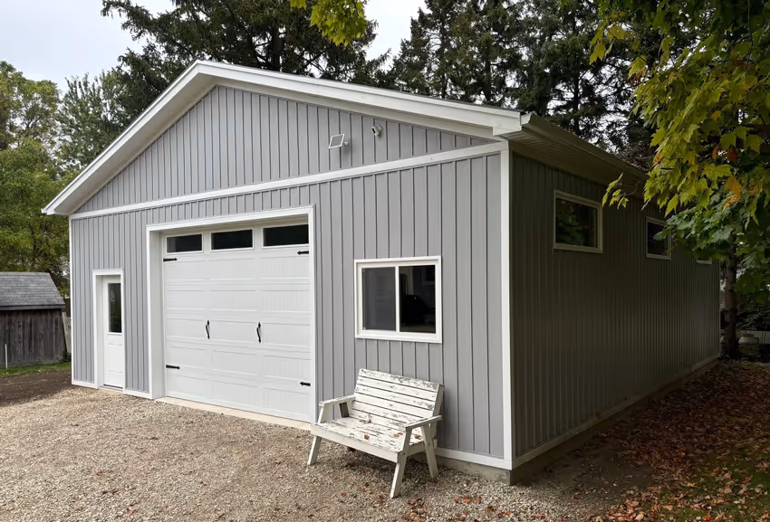 Photo of the garage of the newly renovated house with the bench