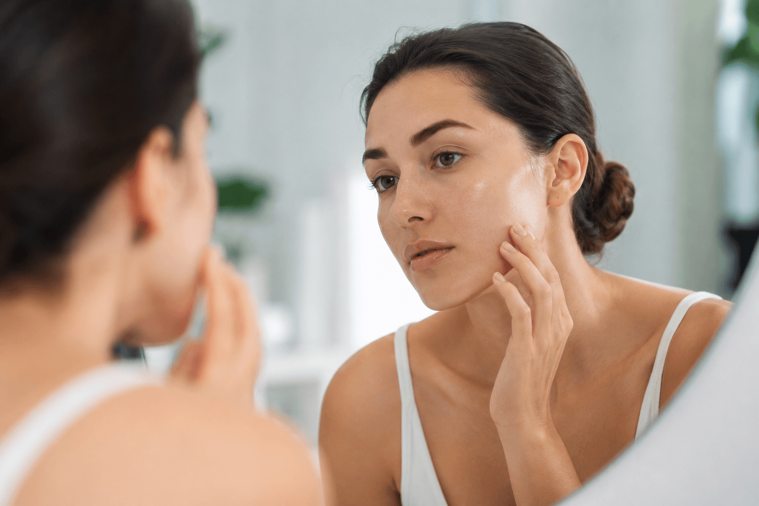 Woman with naturally radiant, hydrated skin after a Skinvive treatment consultation at an aesthetic medspa in Rockwall, Texas