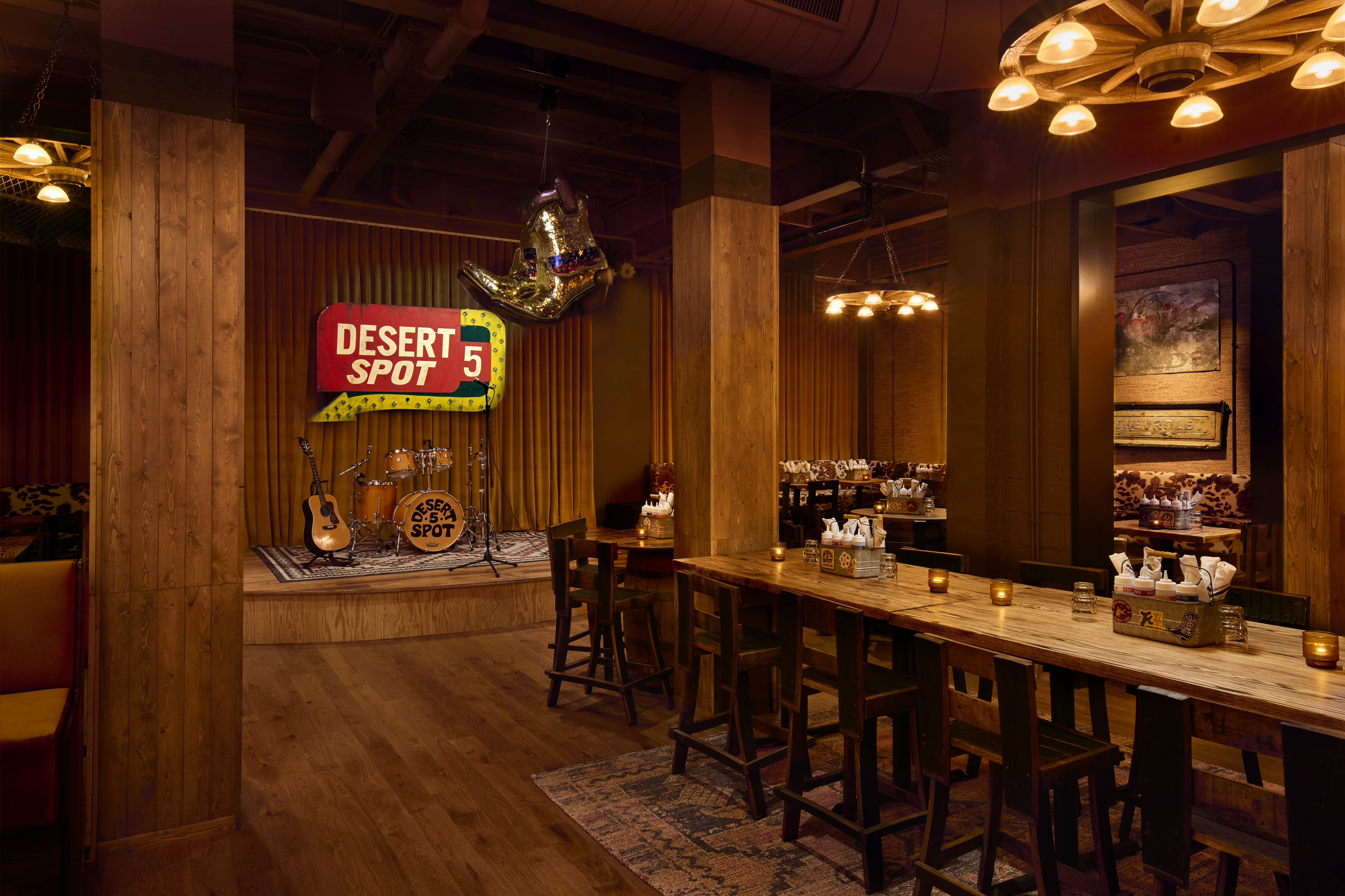 DC stage with disco cowboy boots and restaurant seating