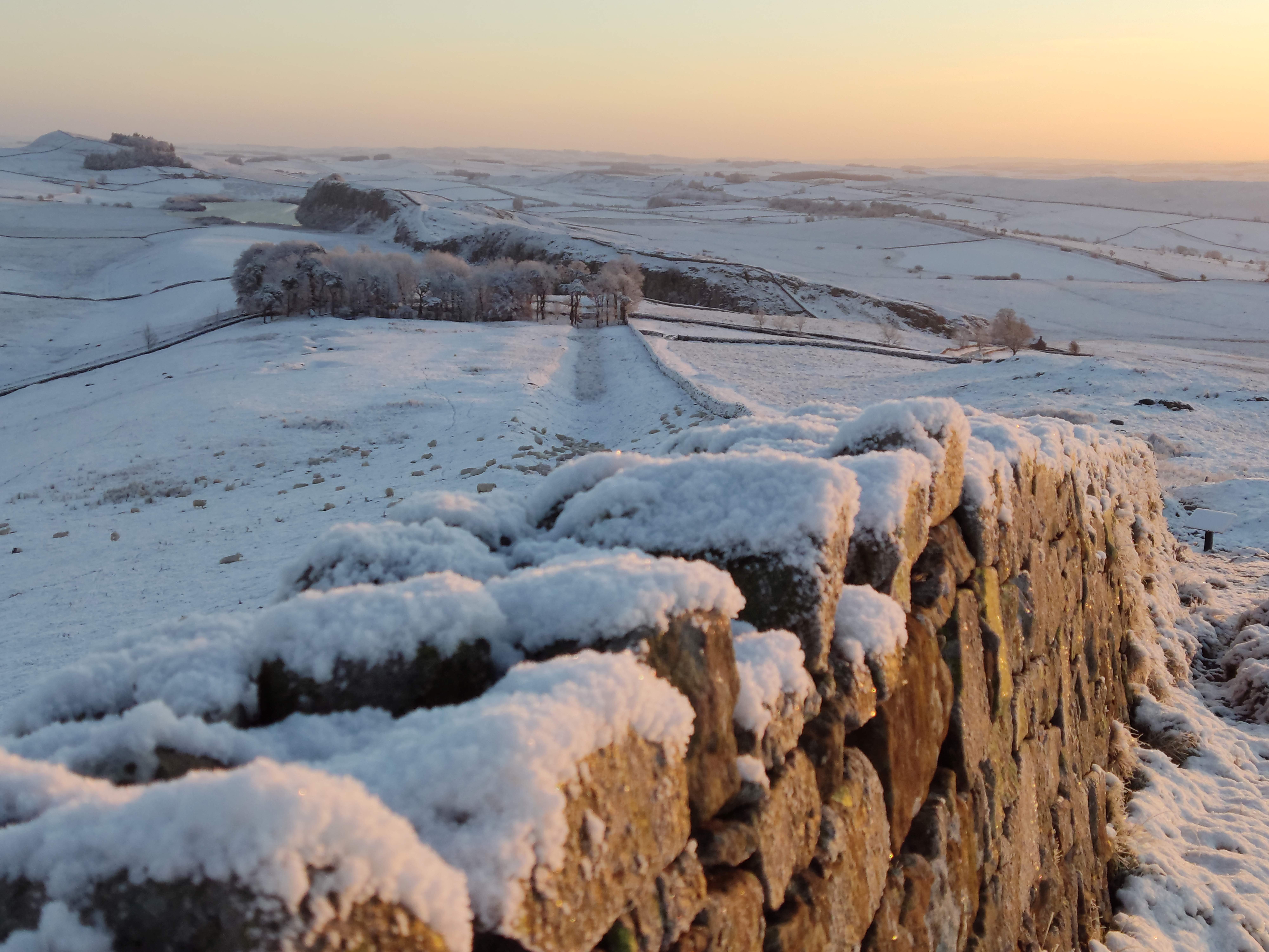 Hadrian's Wall Path National Trail in winter covered with snow