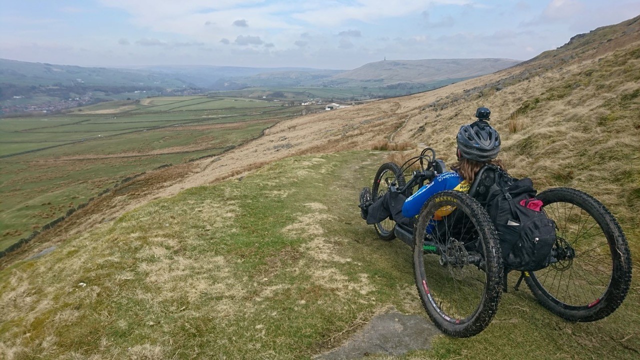  A wheelchair user looks out across the Pennine Bridleway National Trail